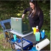 GCI OUTDOOR Slim-Fold Cook Station | Portable Folding Kitchen Table with a Heat Resistant Tabletop, 4 Side Tables & Storage Rack, Perfect for Picnics & Camping Trips(Slim Fold Cook Station)